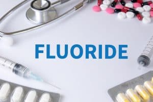 FLUORIDE Text, On Background of Medicaments Composition, Stethoscope, mix therapy drugs doctor flu antibiotic pharmacy medicine medical
