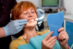 woman receiving dental cleaning