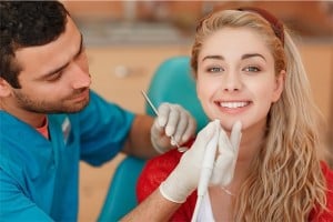 Woman patient at dentist dental clinic teeth care