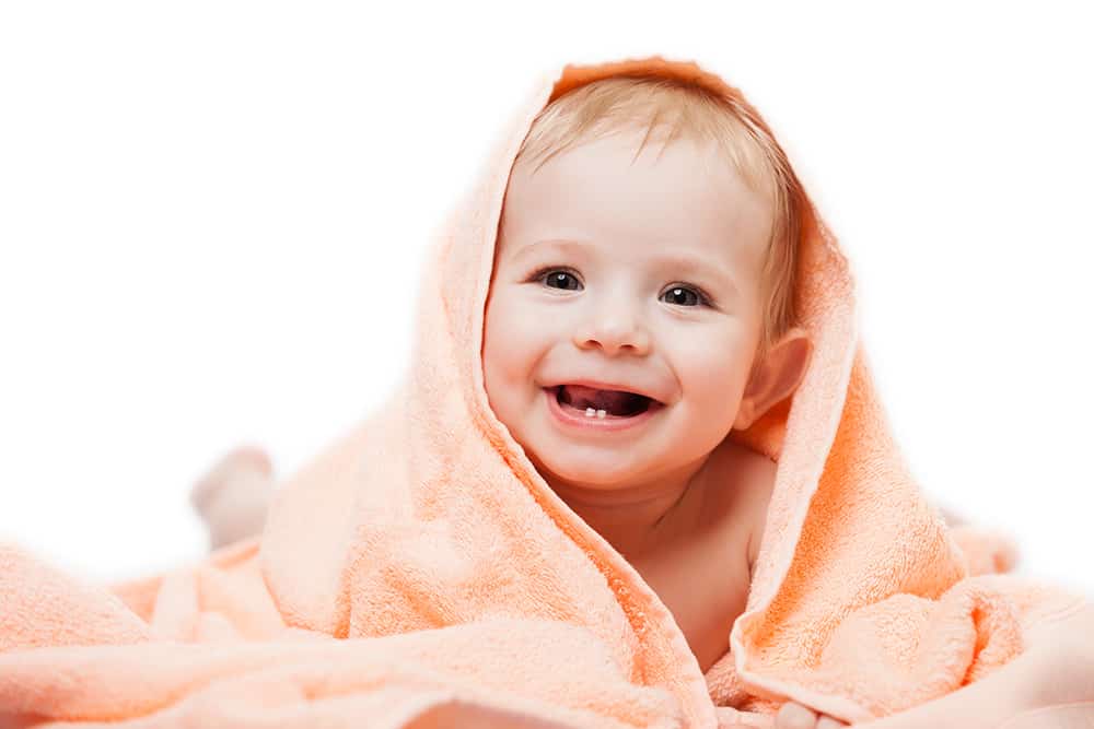 Breastfeeding and the dental health benefits a baby happy with good dental health after breastfeeding