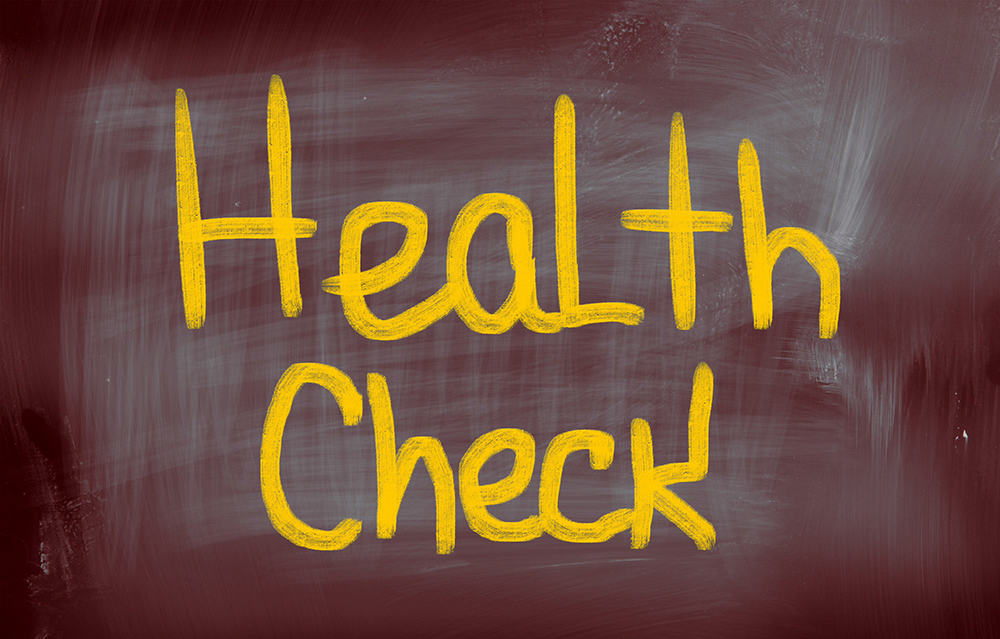 Diabetes and Gum Disease Helth Check A chalk board with the words "health check" written on it for diabetes and gum disease awareness