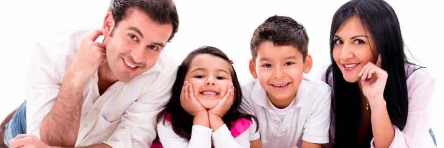 Happy family smiling - isolated over a white background