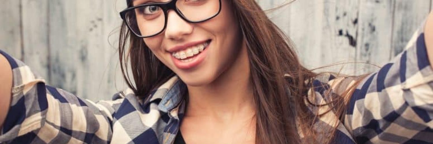 Selfie of woman smiling with braces