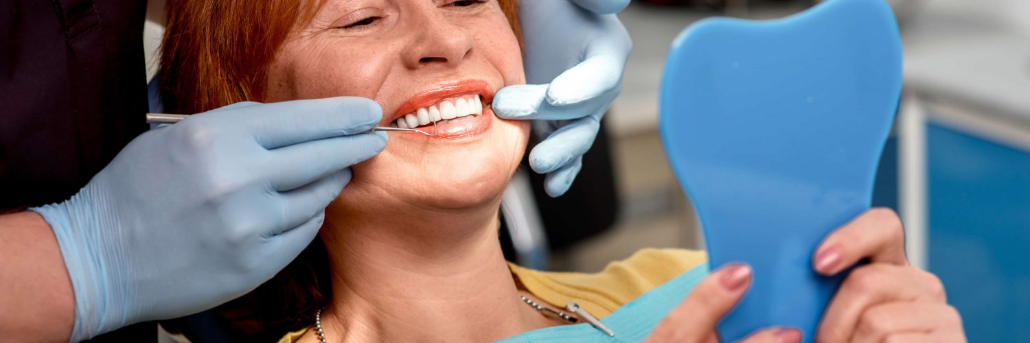 woman receiving dental cleaning