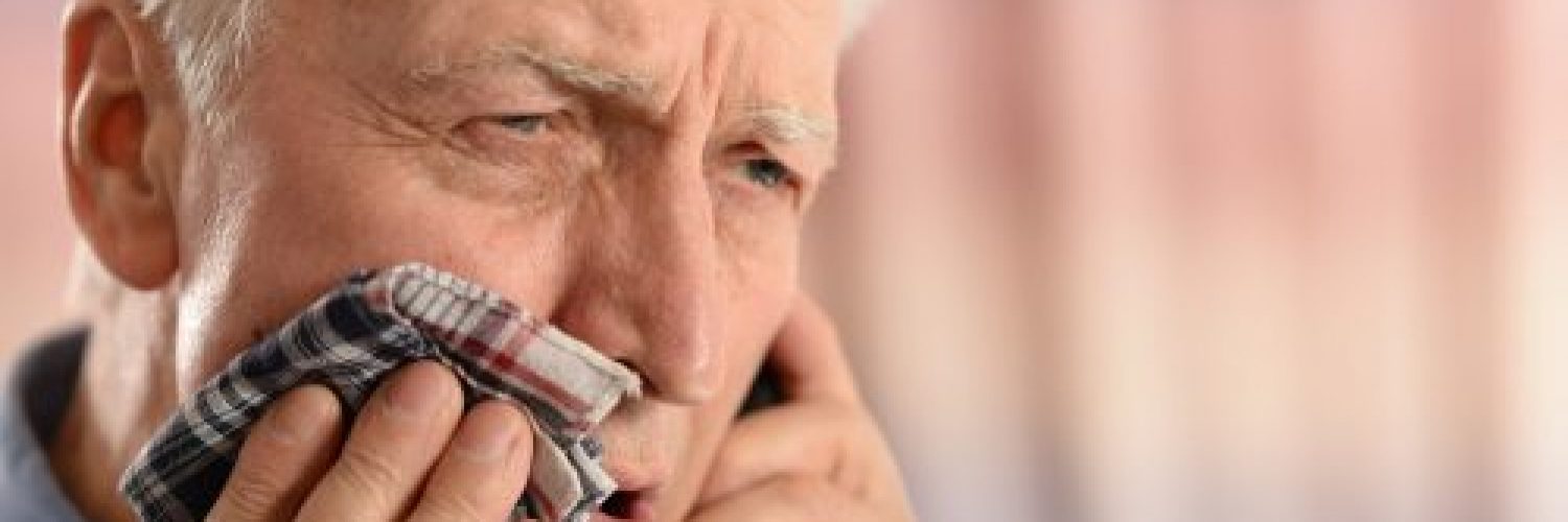 man with toothache calling emergency dentist