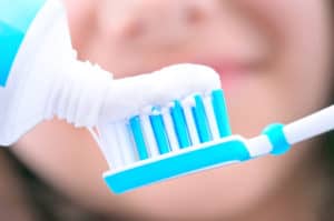 close-up of toothpaste on toothbrush