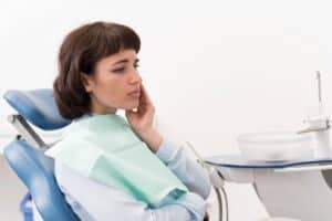 Young Women Suffering Tooth Extraction Complications, idaho falls, local dentist near me, dental